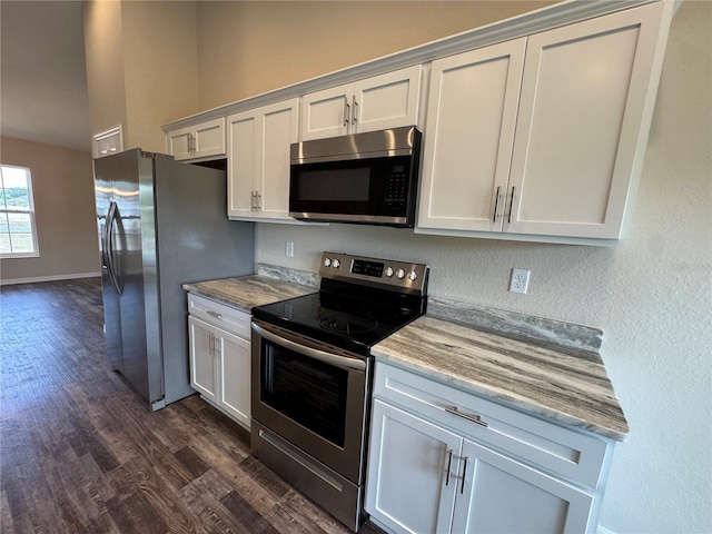 6711 SW 64th Ave, Ocala, FL 34476 - kitchen featuring white cabinets, stainless steel appliances, baseboards, and dark wood finished floors