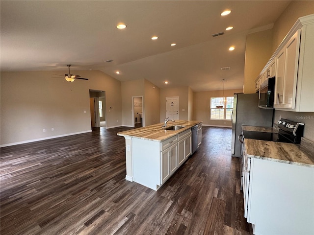 6711 SW 64th Ave, Ocala, FL 34476 - kitchen featuring dark wood-style floors, black microwave, an island with sink, dishwasher, and visible vents