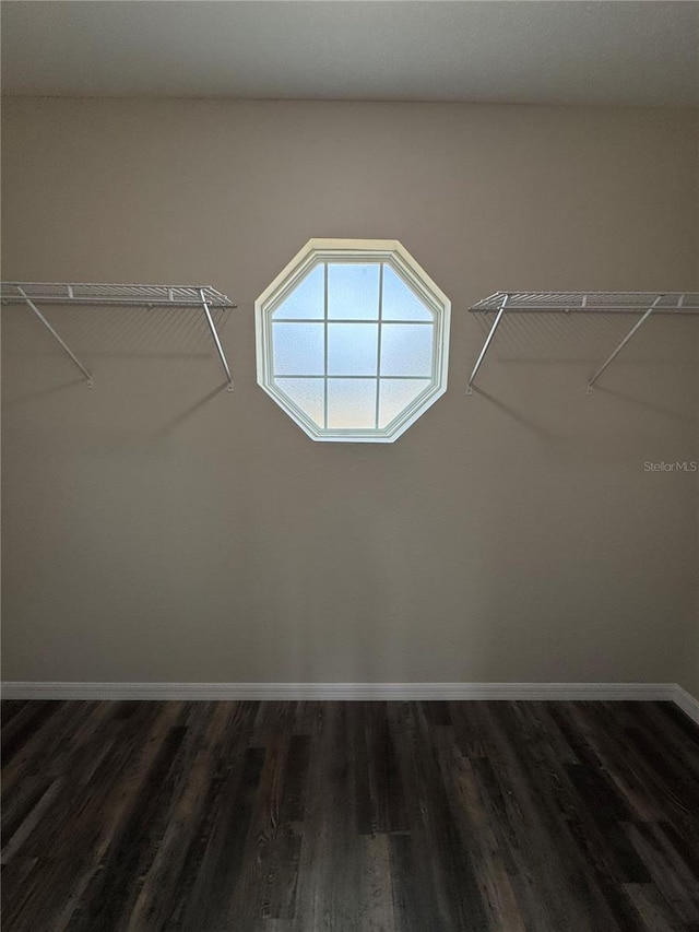 6711 SW 64th Ave, Ocala, FL 34476 - spacious closet featuring dark wood-style floors
