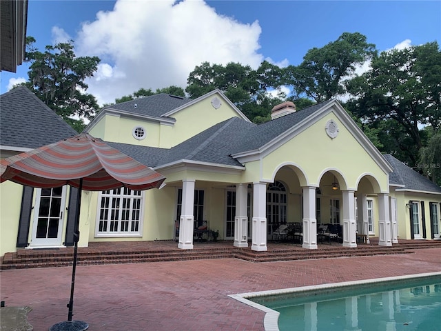 rear view of house with a patio area