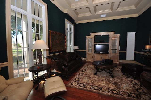 living room with coffered ceiling, wood-type flooring, and ornamental molding