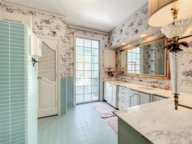 bathroom with tile floors and oversized vanity