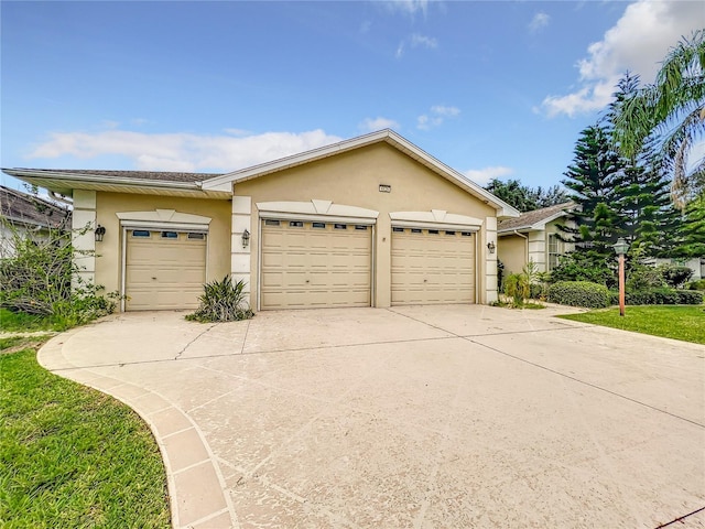 single story home featuring a garage