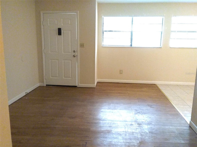 spare room featuring light hardwood / wood-style floors