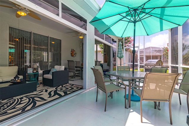 sunroom / solarium with ceiling fan