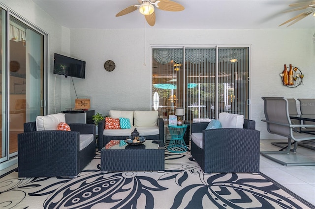 view of patio / terrace with an outdoor living space and ceiling fan