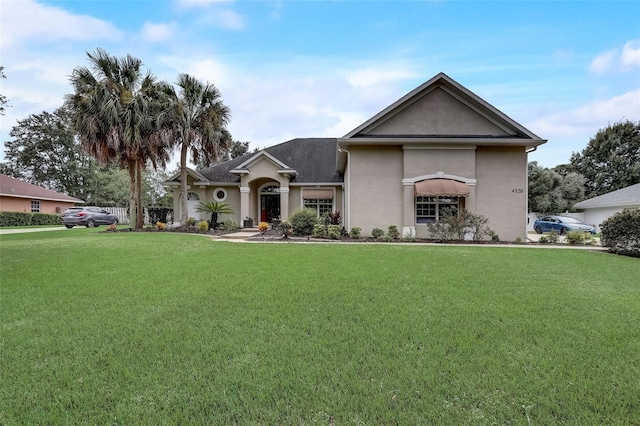 view of front of house with a front lawn