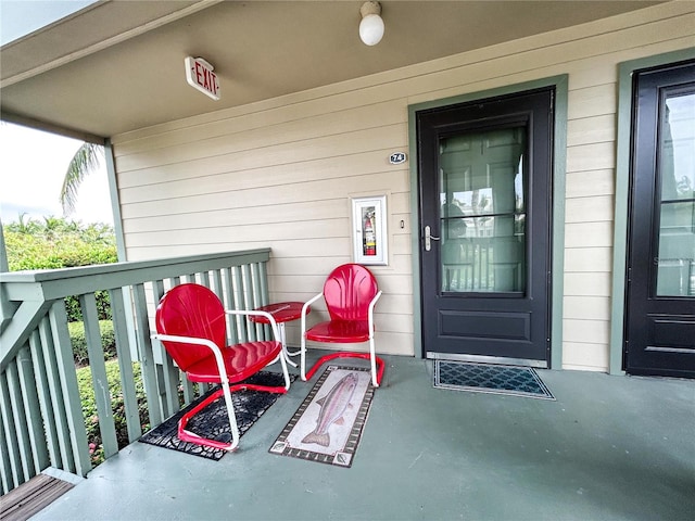 doorway to property with a porch