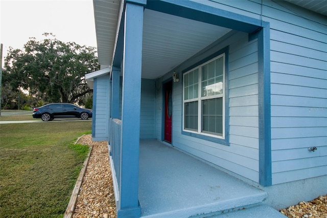 view of property exterior with a yard