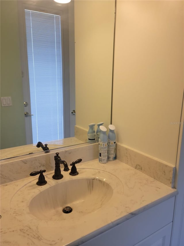 bathroom featuring vanity