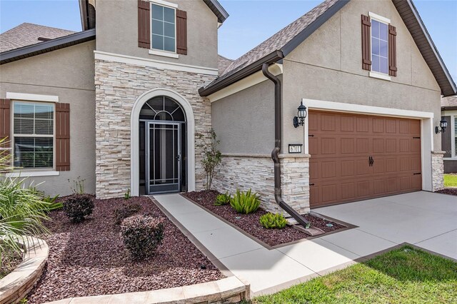 property entrance featuring a garage