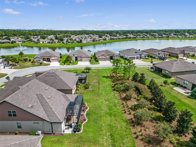 drone / aerial view with a water view