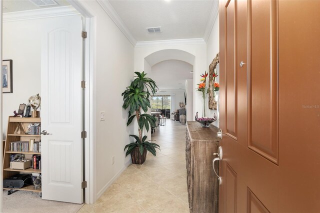 interior space with crown molding