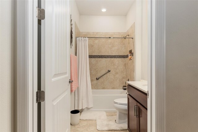 full bathroom featuring vanity, tile flooring, toilet, and shower / bathtub combination with curtain