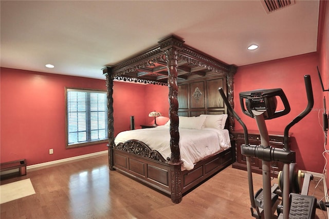 bedroom with light hardwood / wood-style flooring