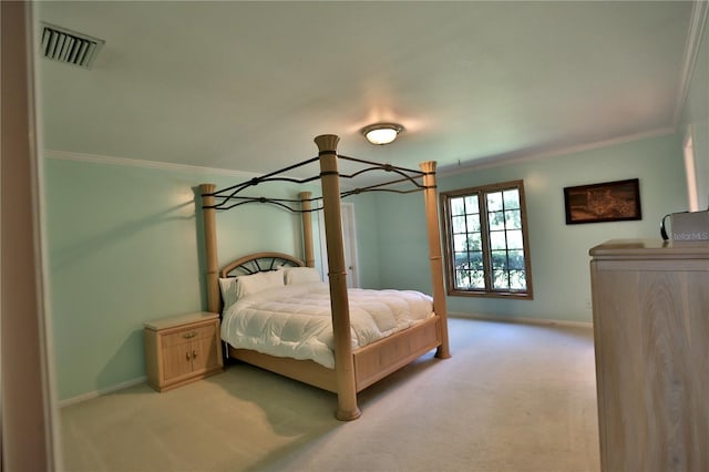 bedroom with light carpet, ornamental molding, and a notable chandelier