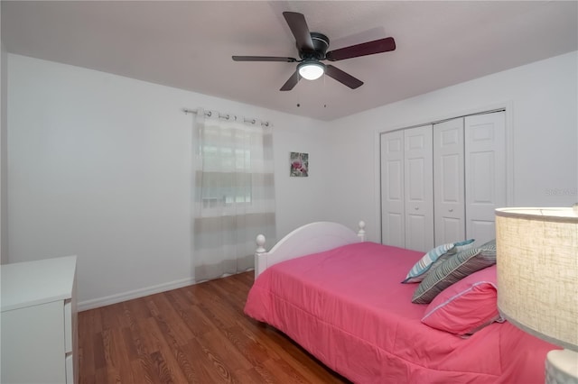 bedroom featuring a closet, ceiling fan, and dark hardwood / wood-style floors