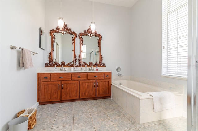 bathroom with a relaxing tiled bath, tile floors, and oversized vanity