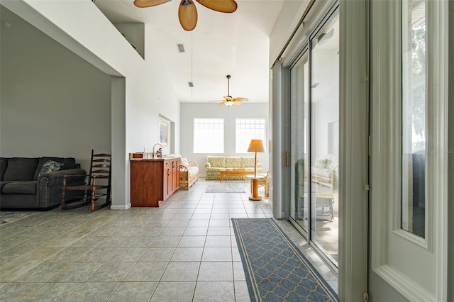 interior space featuring ceiling fan