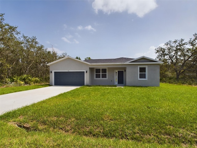 ranch-style home with a front lawn and a garage