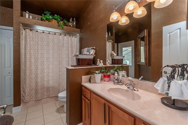 bathroom with tile patterned floors, vanity, toilet, and a shower with curtain