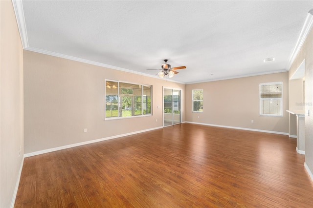 unfurnished living room with hardwood / wood-style floors, ceiling fan, crown molding, and a textured ceiling