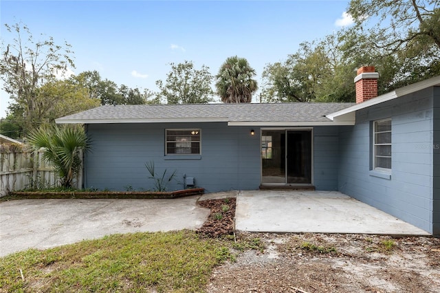 rear view of property with a patio area