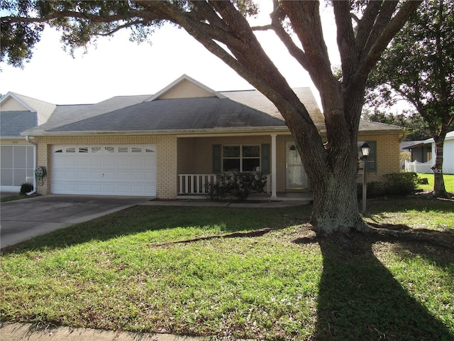 ranch-style home with a front yard and a garage