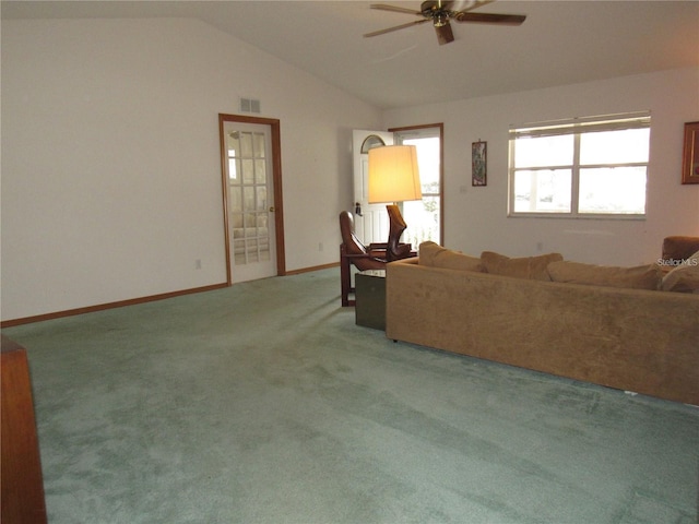 carpeted living room featuring vaulted ceiling and ceiling fan