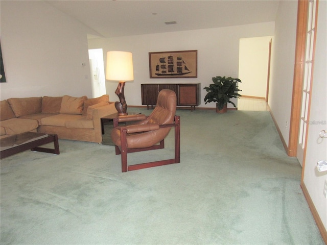 living room with light colored carpet