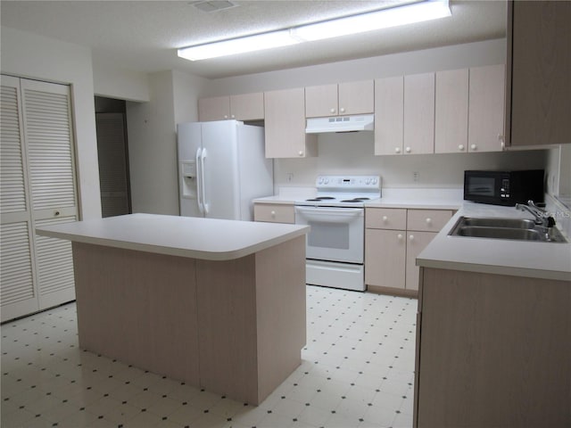 kitchen featuring sink, a kitchen island, light tile floors, and white appliances