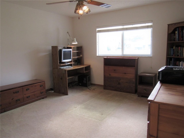 home office with light colored carpet and ceiling fan