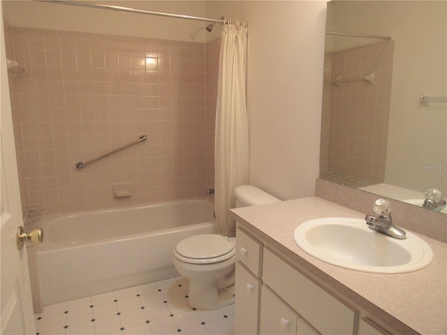 full bathroom with tile flooring, toilet, shower / tub combo, and vanity