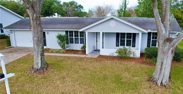 ranch-style house with a front yard and a garage