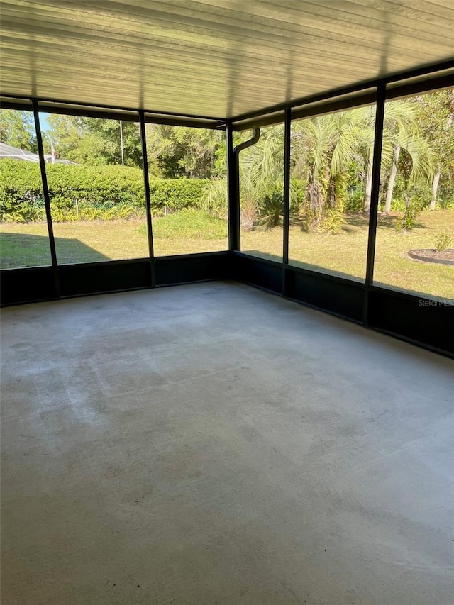 unfurnished sunroom with a healthy amount of sunlight