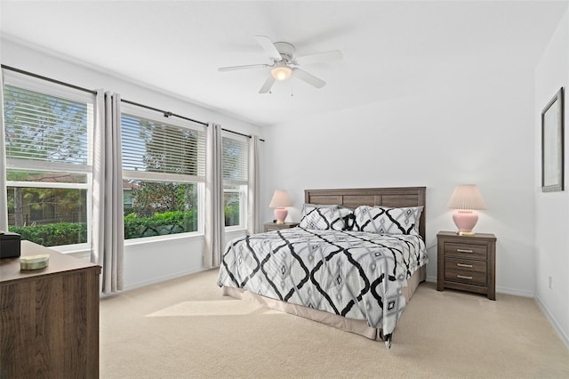 3554 NW 55th Cir, Ocala, FL 34482 - carpeted bedroom with baseboards and ceiling fan