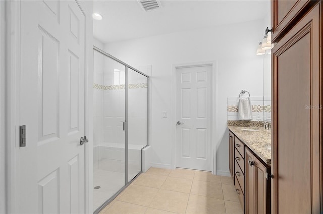 3554 NW 55th Cir, Ocala, FL 34482 - bathroom with tile patterned floors, a shower stall, and vanity
