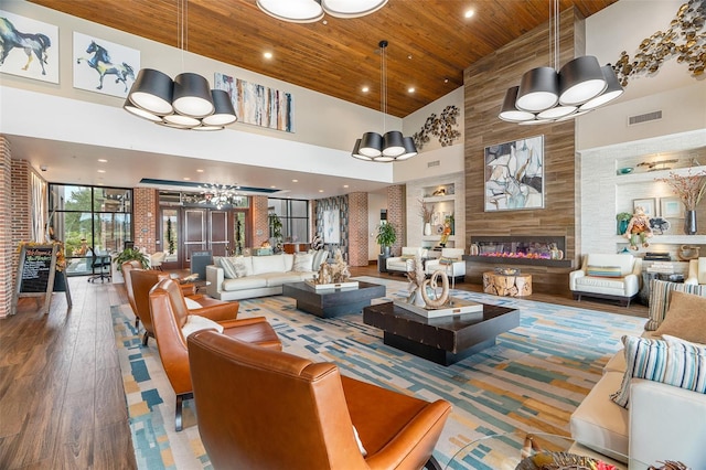 3554 NW 55th Cir, Ocala, FL 34482 - common area featuring high vaulted ceiling, wood ceiling, and recessed lighting