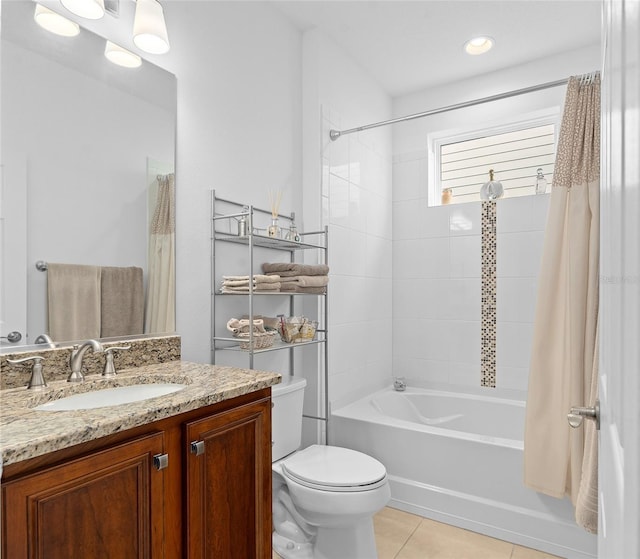 3554 NW 55th Cir, Ocala, FL 34482 - bathroom featuring tile patterned flooring, toilet, shower / bath combo, and vanity