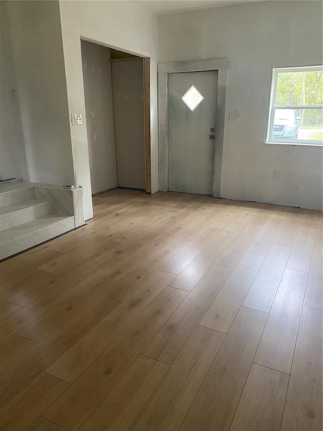 entryway with light hardwood / wood-style floors