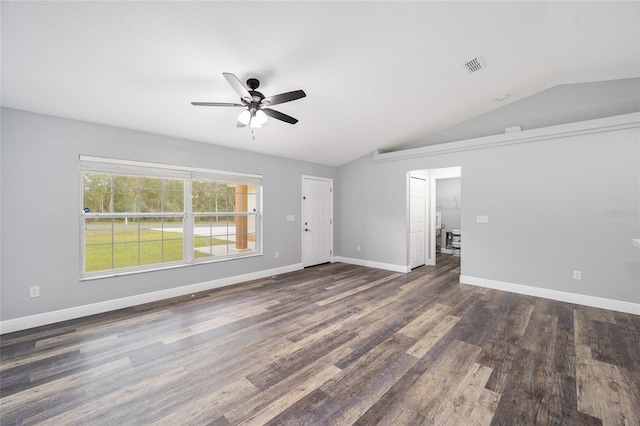 unfurnished room featuring vaulted ceiling, ceiling fan, and dark wood-type flooring