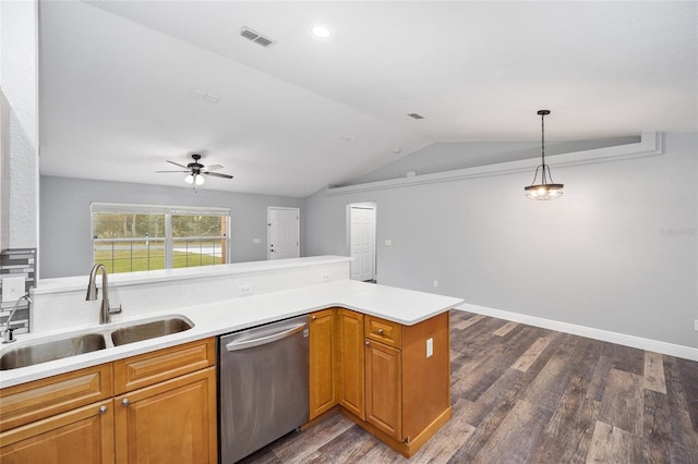 kitchen with lofted ceiling, sink, hanging light fixtures, stainless steel dishwasher, and kitchen peninsula