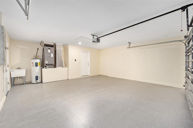 garage with heating unit, sink, a garage door opener, and water heater