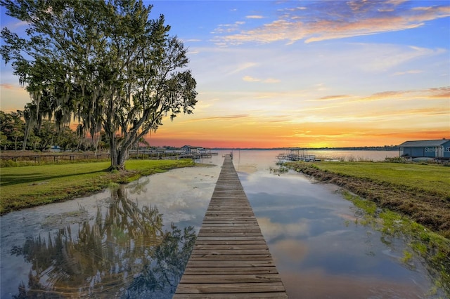 dock area featuring a water view