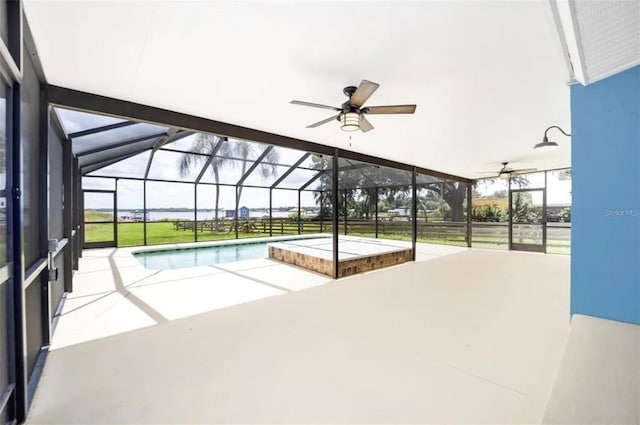 view of pool featuring a patio, a lanai, and ceiling fan