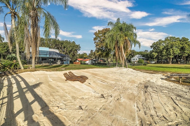 view of yard featuring a lanai