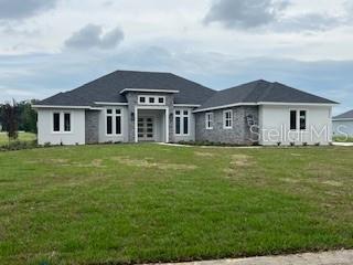 view of front of property with a front yard