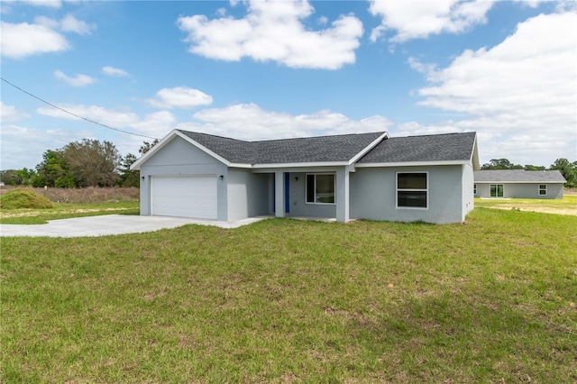 ranch-style home with a front lawn and a garage