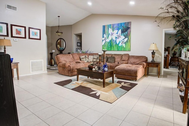 tiled living room featuring lofted ceiling