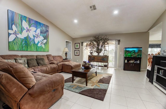 tiled living room with lofted ceiling